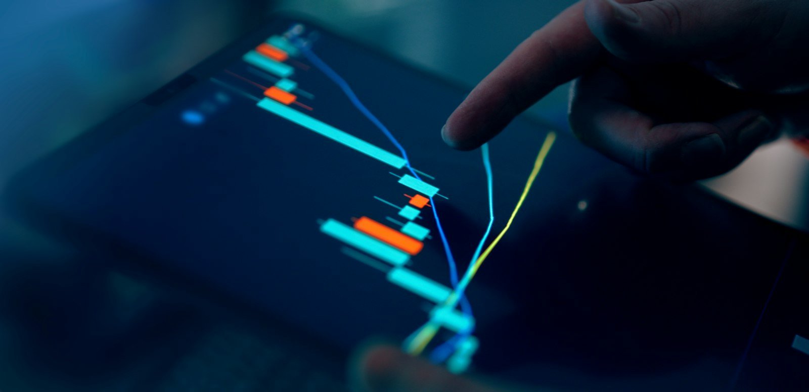 Investor checking an index fund chart on a tablet
